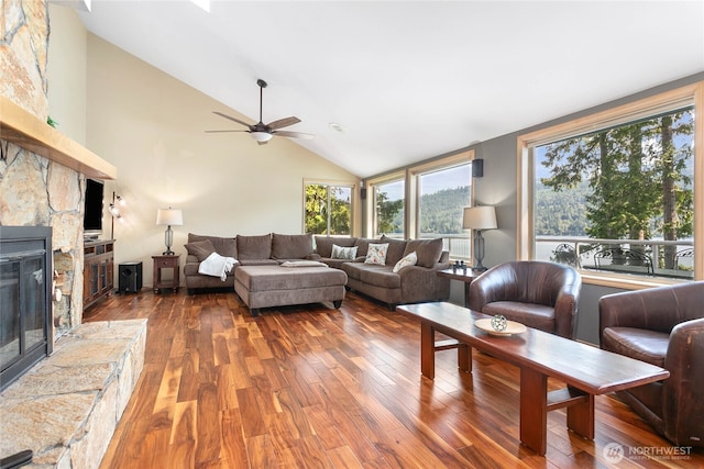 8 Far Summit Pl, Bellingham, WA 98229 - living area featuring lofted ceiling, hardwood / wood-style flooring, a ceiling fan, and a stone fireplace