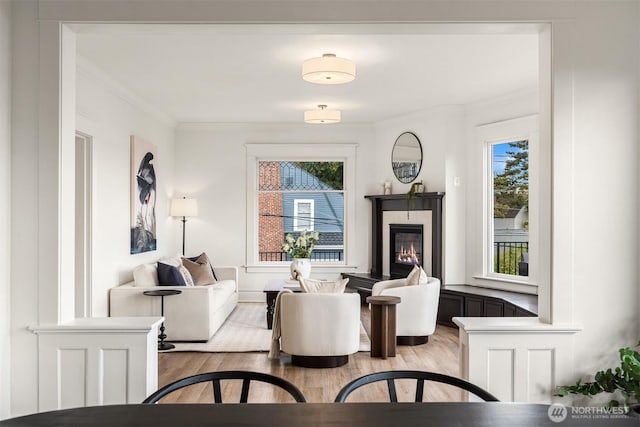 3807 E Jefferson St, Seattle, WA 98122 - living room with light wood-style flooring, a fireplace, and ornamental molding