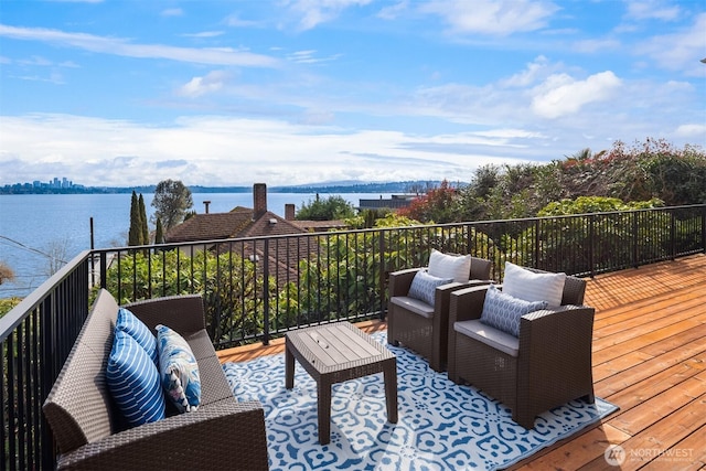 3807 E Jefferson St, Seattle, WA 98122 - wooden terrace featuring a water view and outdoor lounge area