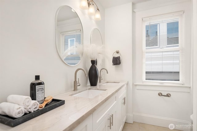 3807 E Jefferson St, Seattle, WA 98122 - full bathroom with double vanity, baseboards, and tile patterned floors