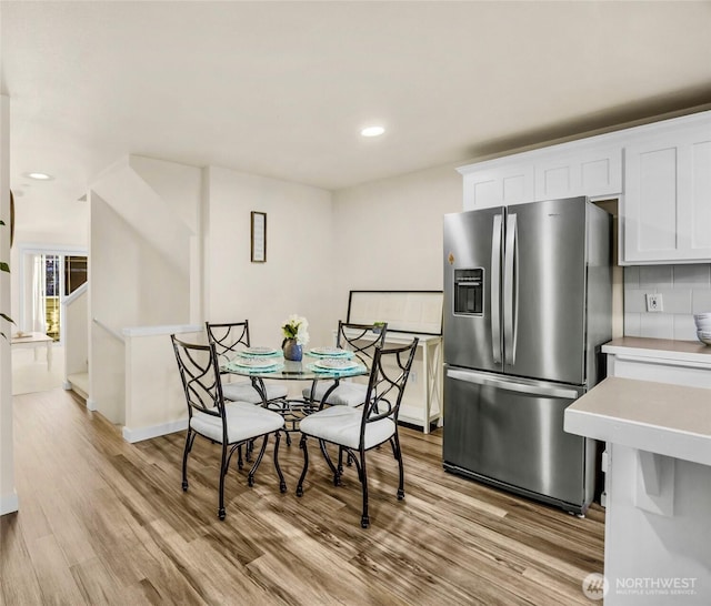 3604 22nd Ave W, Seattle, WA 98199 - dining room with light wood-style flooring and recessed lighting