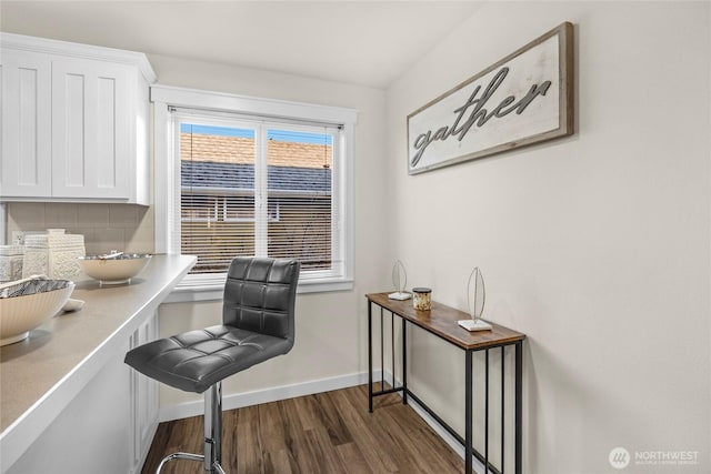 3604 22nd Ave W, Seattle, WA 98199 - office area with dark wood-style flooring and baseboards