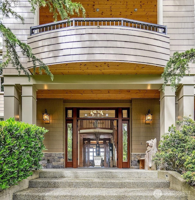 3430 Sevenich Dr, Everett, WA 98201 - entrance to property with stone siding, a balcony, and covered porch
