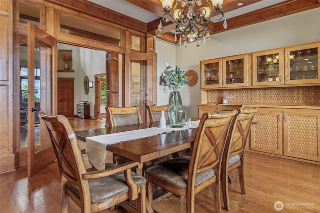 3430 Sevenich Dr, Everett, WA 98201 - dining room featuring a chandelier, french doors, light wood-type flooring, and beam ceiling