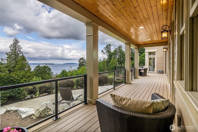 3430 Sevenich Dr, Everett, WA 98201 - wooden deck with a water view