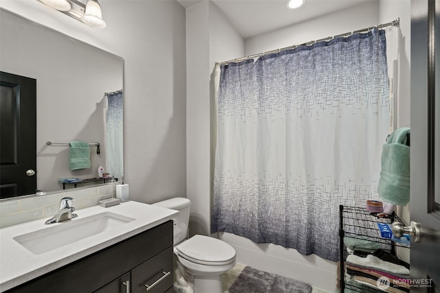 1116 NE 14th Way, Battle Ground, WA 98604 - bathroom with vanity, toilet, and shower / bathtub combination with curtain