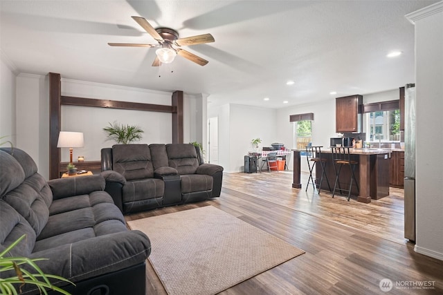 477 SE Old Arcadia Rd, Shelton, WA 98584 - living area with a ceiling fan, light wood-style floors, crown molding, and recessed lighting