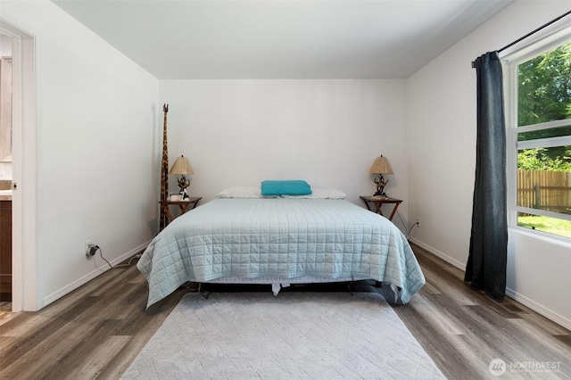 477 SE Old Arcadia Rd, Shelton, WA 98584 - bedroom with wood finished floors and baseboards
