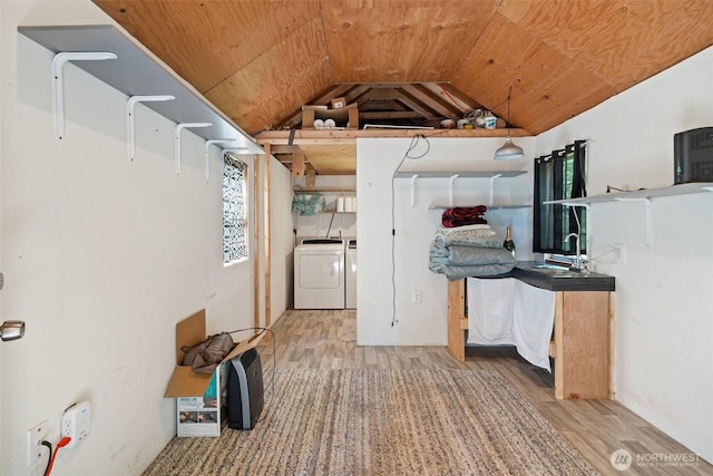 477 SE Old Arcadia Rd, Shelton, WA 98584 - laundry room featuring independent washer and dryer, light wood-style floors, and wood ceiling
