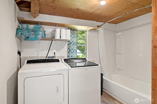 477 SE Old Arcadia Rd, Shelton, WA 98584 - laundry area with washer and clothes dryer and light wood finished floors