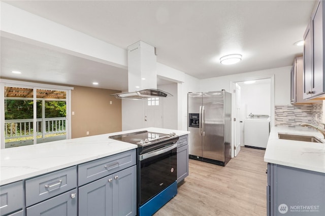 24028 135th Ave SE, Kent, WA 98042 - kitchen with appliances with stainless steel finishes, washer / clothes dryer, extractor fan, a sink, and gray cabinets