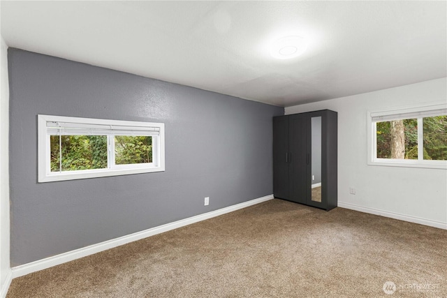 24028 135th Ave SE, Kent, WA 98042 - unfurnished bedroom featuring carpet and baseboards