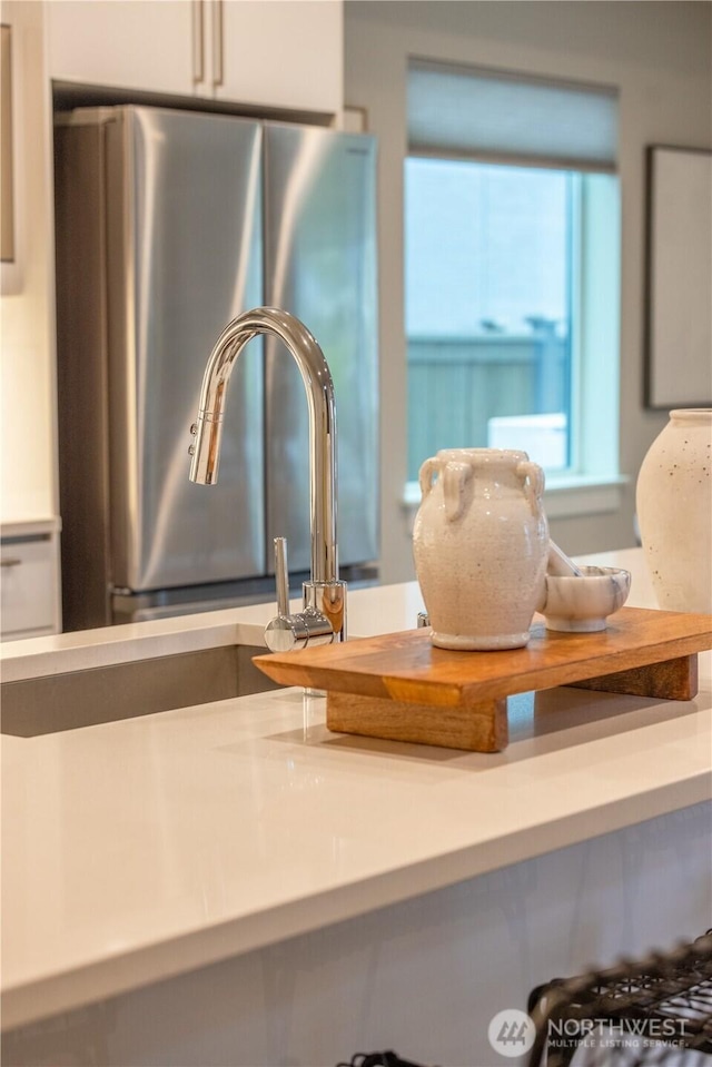 33488 Golden Lakes Ln SE, Black Diamond, WA 98010 - kitchen view of freestanding refrigerator and light countertops