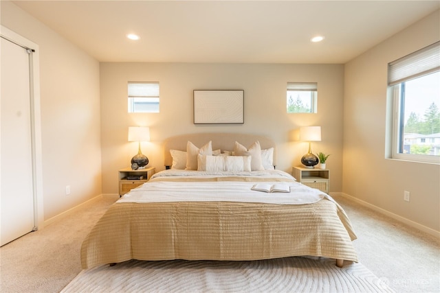 33488 Golden Lakes Ln SE, Black Diamond, WA 98010 - bedroom with light carpet, recessed lighting, and baseboards
