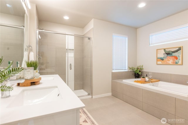 33488 Golden Lakes Ln SE, Black Diamond, WA 98010 - full bathroom with a garden tub, a stall shower, double vanity, tile patterned floors, and recessed lighting