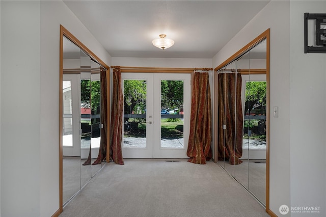 45019 284th Ave SE, Enumclaw, WA 98022 - carpeted entryway with french doors and plenty of natural light
