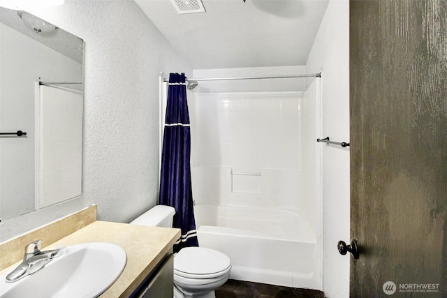 524 New Gate Dr, Prosser, WA 99350 - full bathroom with a textured wall, vanity, shower / bath combo with shower curtain, and toilet