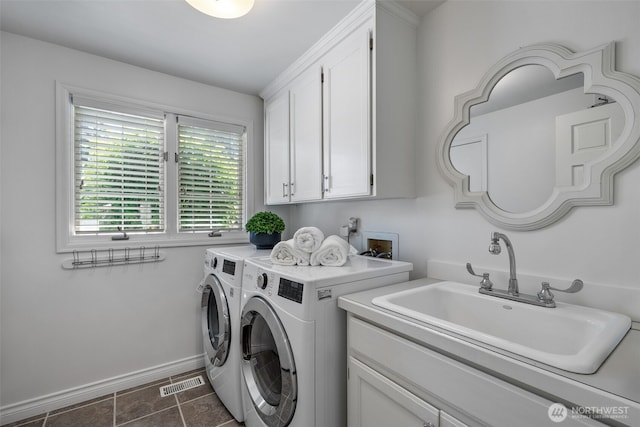 20520 NE 35th Pl, Sammamish, WA 98074 - washroom with washer and clothes dryer and cabinet space