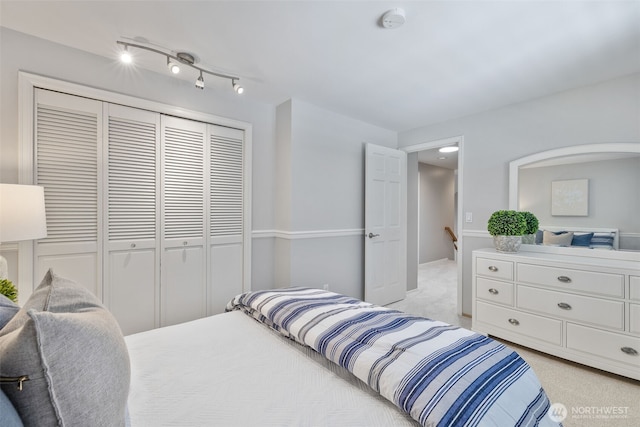 20520 NE 35th Pl, Sammamish, WA 98074 - bedroom featuring a closet and light colored carpet