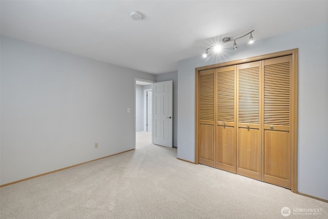 20520 NE 35th Pl, Sammamish, WA 98074 - unfurnished bedroom with carpet floors, track lighting, and a closet