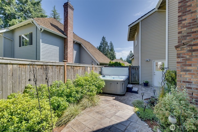 20520 NE 35th Pl, Sammamish, WA 98074 - fenced backyard with a hot tub and a patio