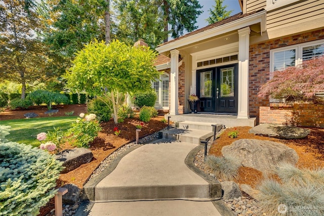 20520 NE 35th Pl, Sammamish, WA 98074 - view of exterior entry with french doors and brick siding