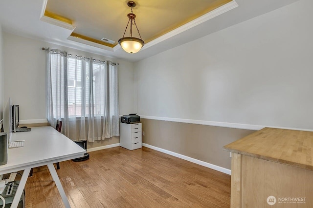 6715 Quincy Ave SE, Auburn, WA 98092 - office featuring a tray ceiling, light wood-style flooring, baseboards, and ornamental molding