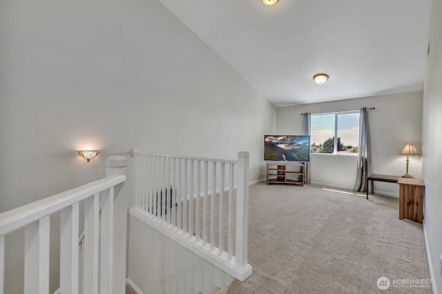 6715 Quincy Ave SE, Auburn, WA 98092 - corridor featuring an upstairs landing, carpet, and baseboards
