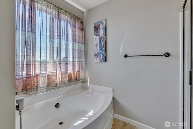 6715 Quincy Ave SE, Auburn, WA 98092 - full bathroom with a garden tub and baseboards
