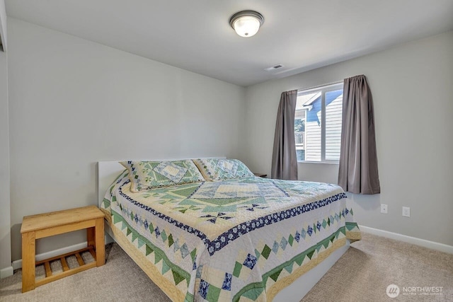 6715 Quincy Ave SE, Auburn, WA 98092 - carpeted bedroom with baseboards