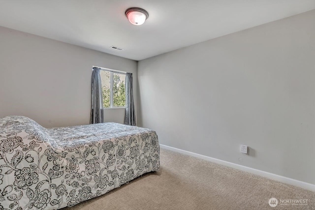 6715 Quincy Ave SE, Auburn, WA 98092 - bedroom featuring carpet floors and baseboards