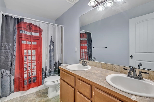 6715 Quincy Ave SE, Auburn, WA 98092 - bathroom featuring toilet, double vanity, and a shower with curtain