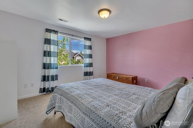 6715 Quincy Ave SE, Auburn, WA 98092 - bedroom featuring carpet and baseboards