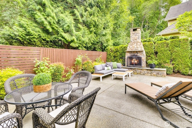2728 206th Ter NE, Sammamish, WA 98074 - fenced backyard featuring a patio, an outdoor living space with a fireplace, and outdoor dining area