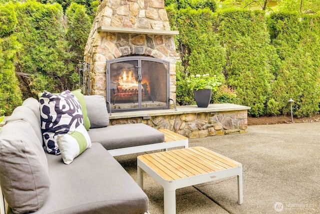 2728 206th Ter NE, Sammamish, WA 98074 - view of patio with an outdoor living space with a fireplace