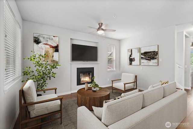 1900 Weaver Rd Unit C106, Snohomish, WA 98290 - living area featuring a glass covered fireplace and a ceiling fan