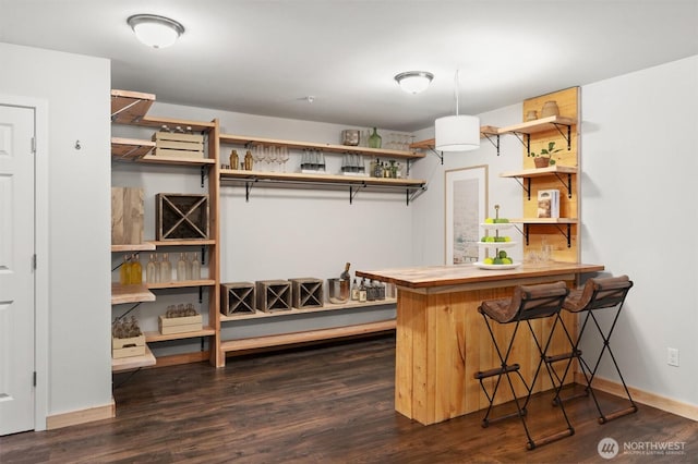 1900 Weaver Rd Unit C106, Snohomish, WA 98290 - bar area featuring dark wood-style flooring and baseboards