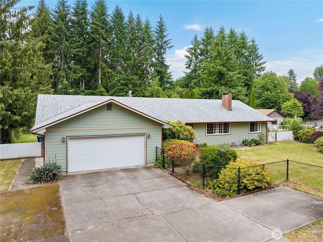 3318 18th Ave SE, Olympia, WA 98501 - ranch-style house featuring a chimney, an attached garage, driveway, and a shingled roof
