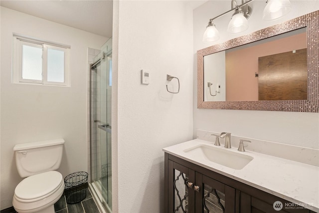 3318 18th Ave SE, Olympia, WA 98501 - bathroom with vanity, toilet, and a stall shower