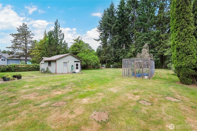 3318 18th Ave SE, Olympia, WA 98501 - view of green lawn with an outbuilding