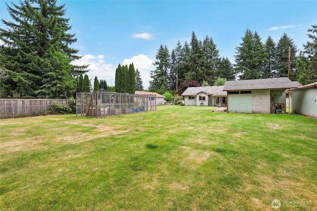 3318 18th Ave SE, Olympia, WA 98501 - view of yard with a greenhouse and an outdoor structure
