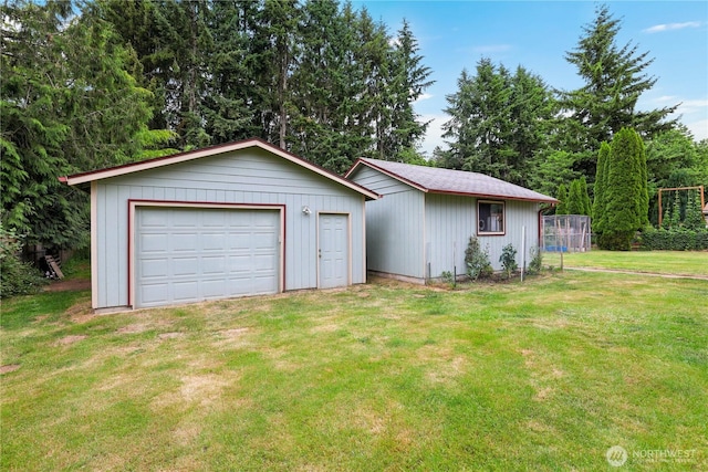 3318 18th Ave SE, Olympia, WA 98501 - ranch-style house with a garage, an outbuilding, a front yard, and driveway