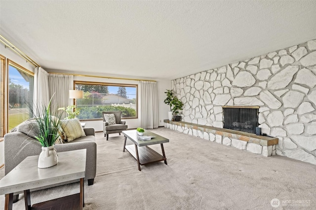 742 I St SW, Quincy, WA 98848 - carpeted living area featuring a textured ceiling and a fireplace