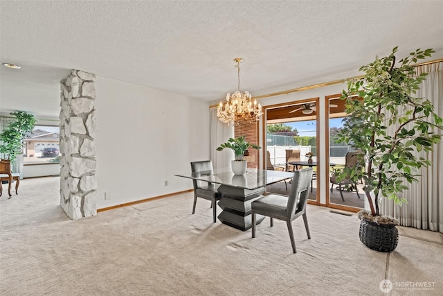 742 I St SW, Quincy, WA 98848 - dining room featuring a textured ceiling, light colored carpet, a chandelier, and baseboards