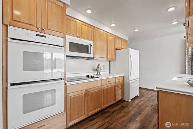 742 I St SW, Quincy, WA 98848 - kitchen featuring white appliances, dark wood finished floors, recessed lighting, and light countertops