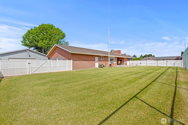 742 I St SW, Quincy, WA 98848 - view of yard with a gate and a patio