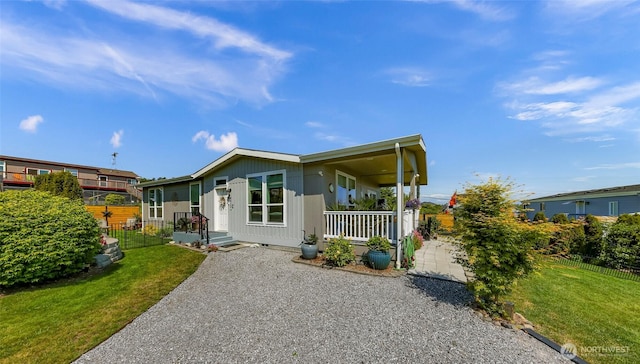 8412 Richard Way, Blaine, WA 98230 - manufactured / mobile home with a porch and gravel driveway
