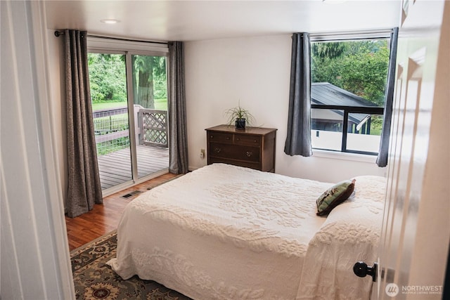 5363 Reese Hill Rd, Sumas, WA 98295 - bedroom featuring access to outside and wood finished floors