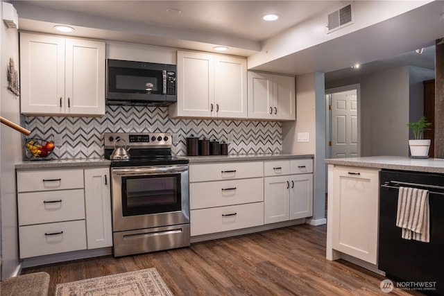 5363 Reese Hill Rd, Sumas, WA 98295 - kitchen featuring electric range, dishwasher, white cabinets, dark wood finished floors, and recessed lighting