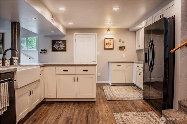 5363 Reese Hill Rd, Sumas, WA 98295 - kitchen with black appliances, dark wood-style flooring, a sink, light countertops, and recessed lighting